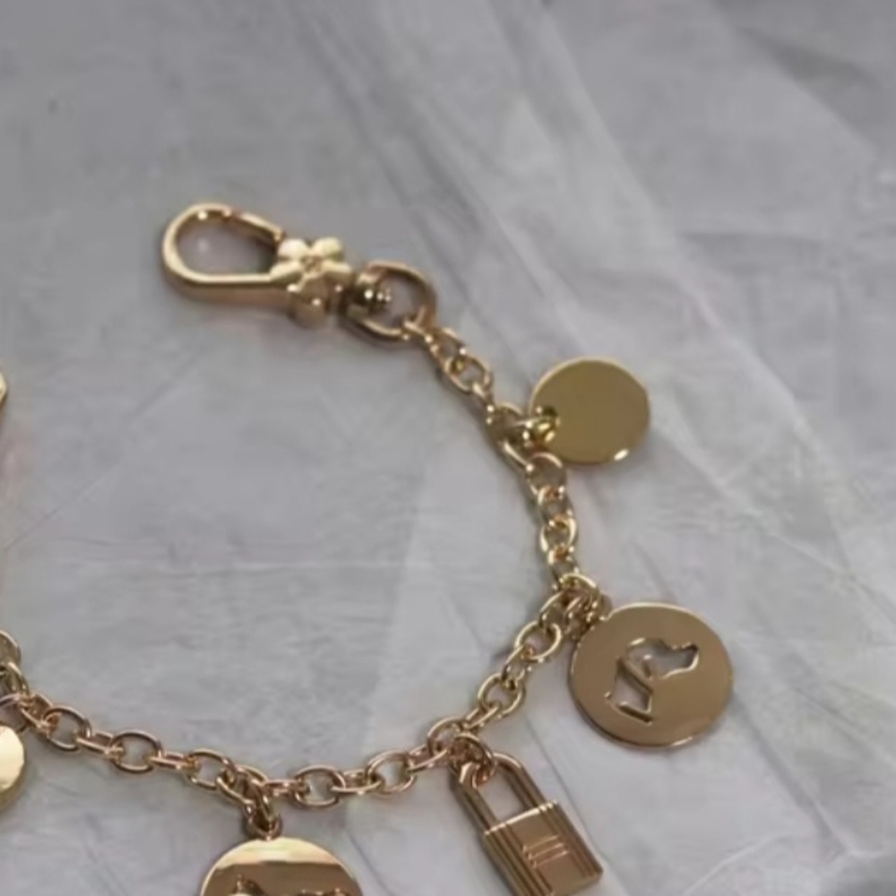 Unbranded Gold metal bagcharm / Strap Extender.